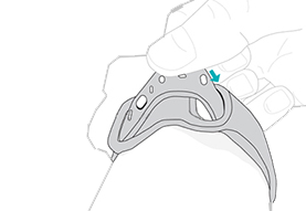 Illustration of someone inserting the tail end of the band through the second loop